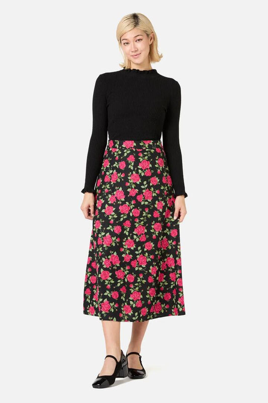 Image of a model wearing Skirts. Productname: Winter Rose Midi Skirt in Pink colour by brand - Princess Highway