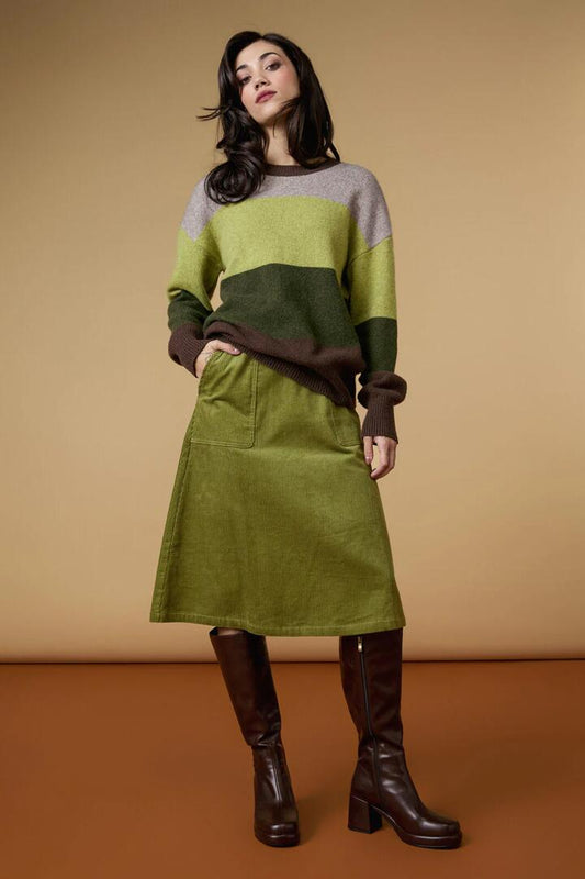 Image of a model wearing Skirts. Productname: Remy Cord Skirt in Green colour by brand - Princess Highway