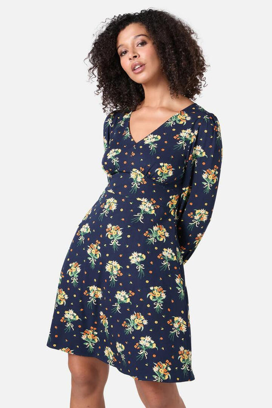 Image of a model wearing Dress. Productname: Lucia Floral Sleeved Dress in Navy colour by brand - Princess Highway