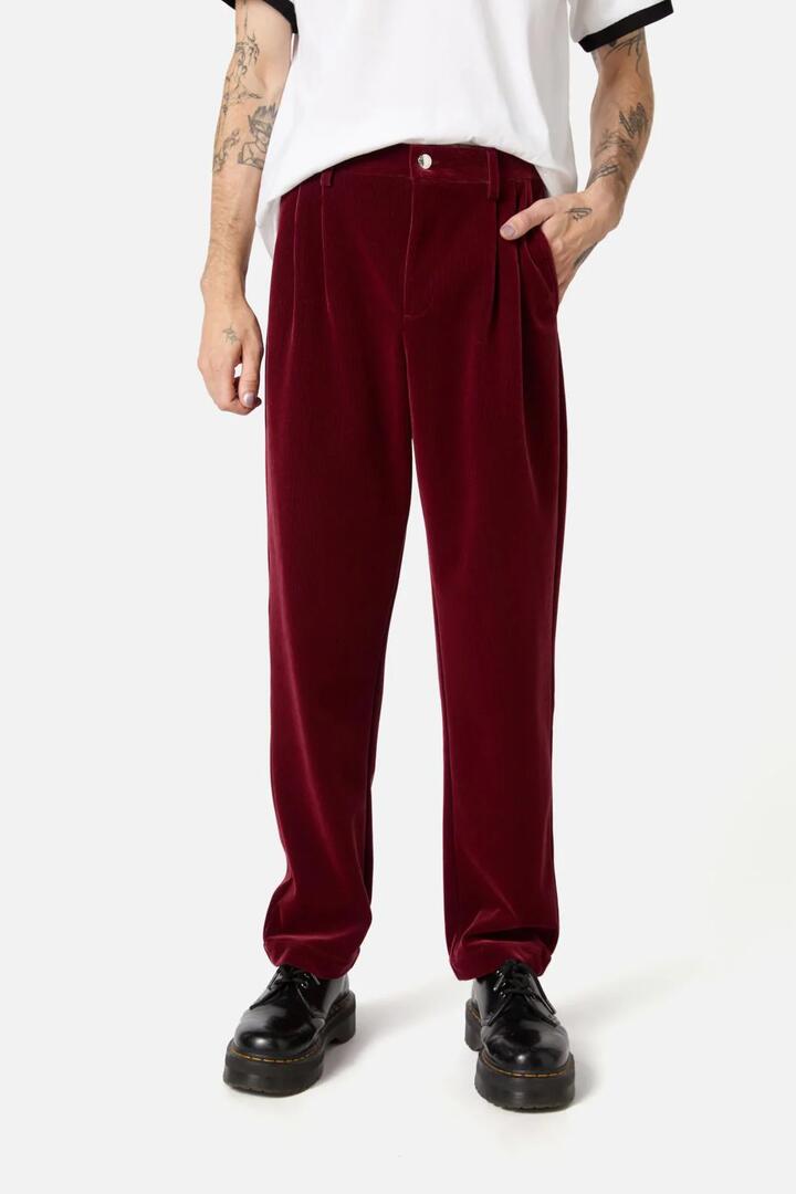 Image of a model wearing Pants. Productname: Prestige Cord Pants in Red/Black colour by brand - Dangerfield