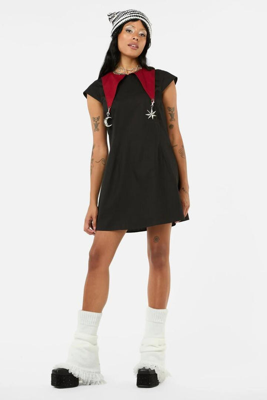Image of a model wearing Dress. Productname: Puppet Show Shift Dress in Black colour by brand - Black Friday