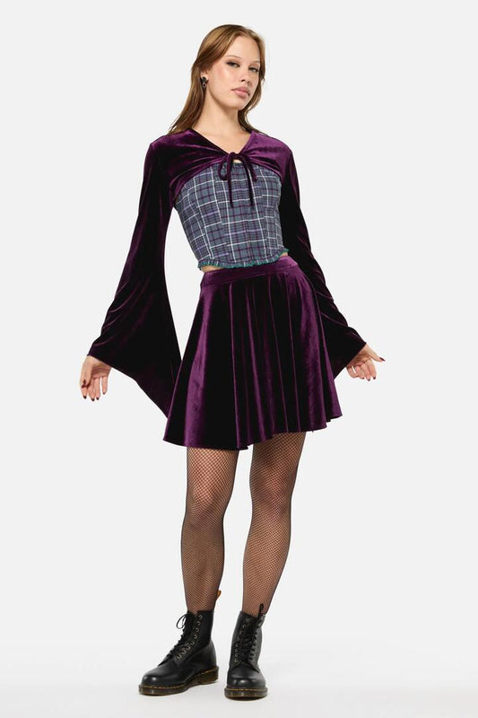 Image of a model wearing Skirts. Productname: Regal Velvet Skirt in Purple colour by brand - Black Friday