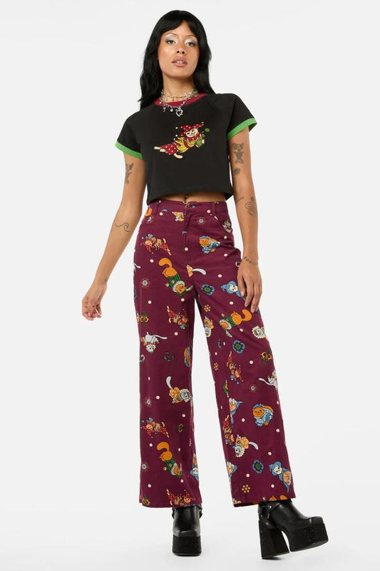 Image of a model wearing Pants. Productname: Left Right Cord Pant in Maroon colour by brand - Black Friday