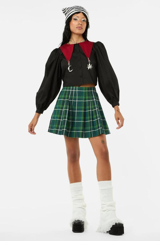 Image of a model wearing Skirts. Productname: Jester Mini Tartan Tennis Skirt in Green colour by brand - Black Friday