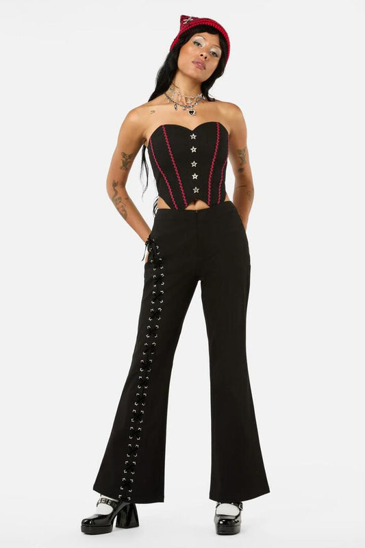 Image of a model wearing Pants. Productname: Iykyk Pop Goth Pant in Black colour by brand - Black Friday