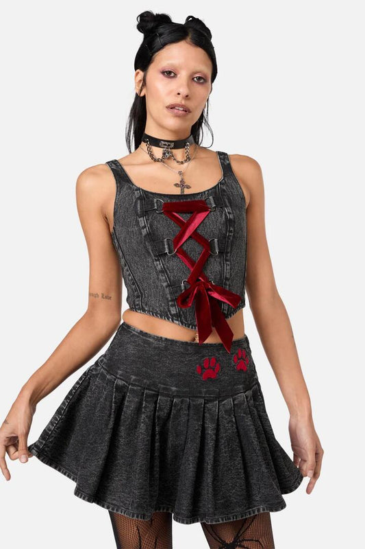 Image of a model wearing Denim. Productname: Moggy Denim Bow Corset Top in Black colour by brand - Dangerfield