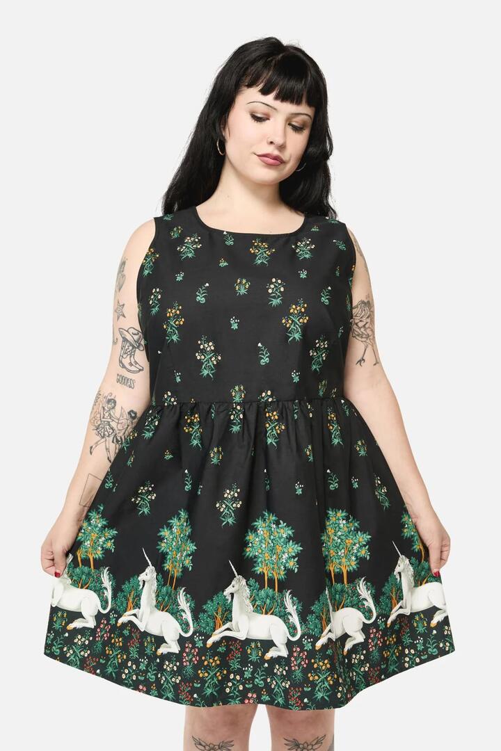 Image of a model wearing Dress. Productname: Curve Heraldry Border Dress in Black colour by brand - Dangerfield