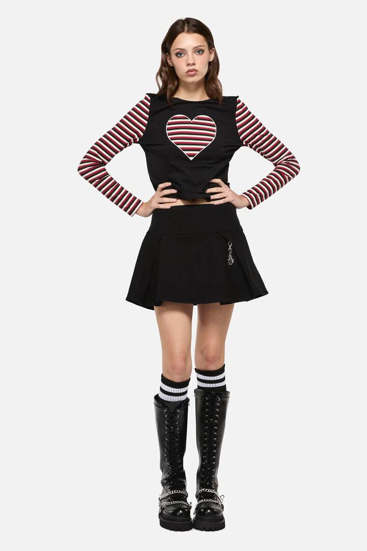 Image of a model wearing Skirts. Productname: Nail In The Coffin Skort in Black colour by brand - Dangerfield