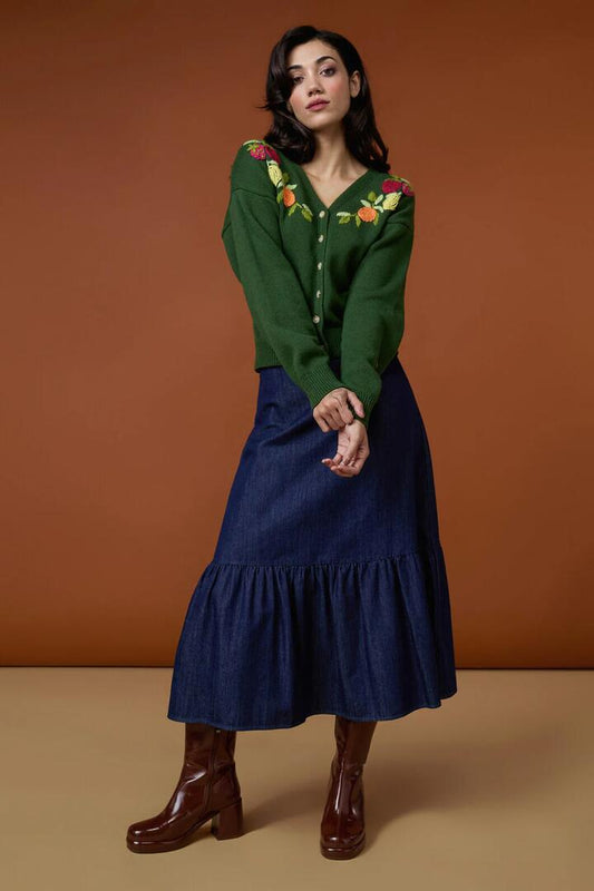 Image of a model wearing Denim. Productname: Kara Denim Midi Skirt in Denim colour by brand - Princess Highway