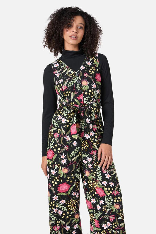Image of a model wearing Outerwear. Productname: Opal Native Jumpsuit in Black colour by brand - Princess Highway