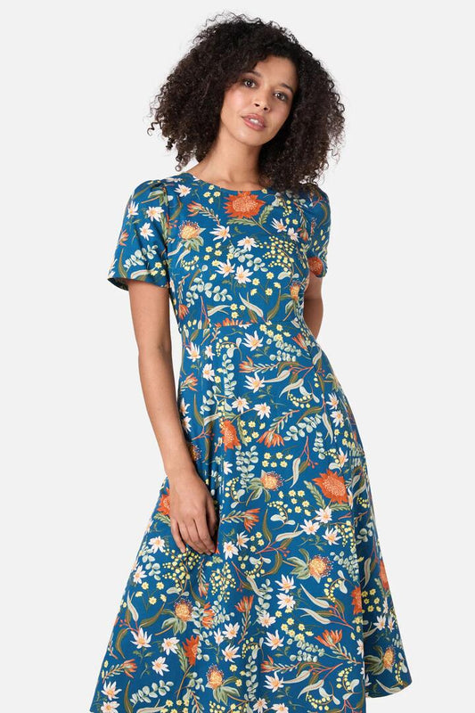 Image of a model wearing Dress. Productname: Opal Native Midi Dress in Teal colour by brand - Princess Highway