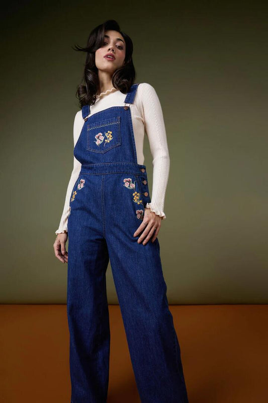 Image of a model wearing Pants. Productname: Elsie Embroidered Overall in Blue Denim colour by brand - Princess Highway