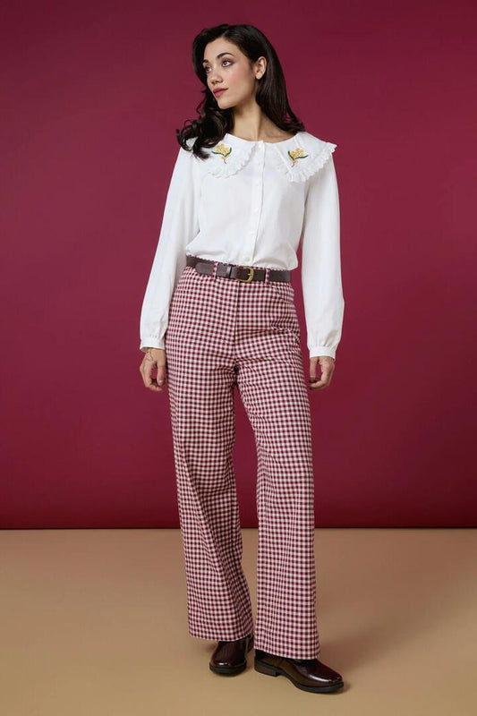 Image of a model wearing Pants. Productname: Renae Check Pant in Berry colour by brand - Princess Highway