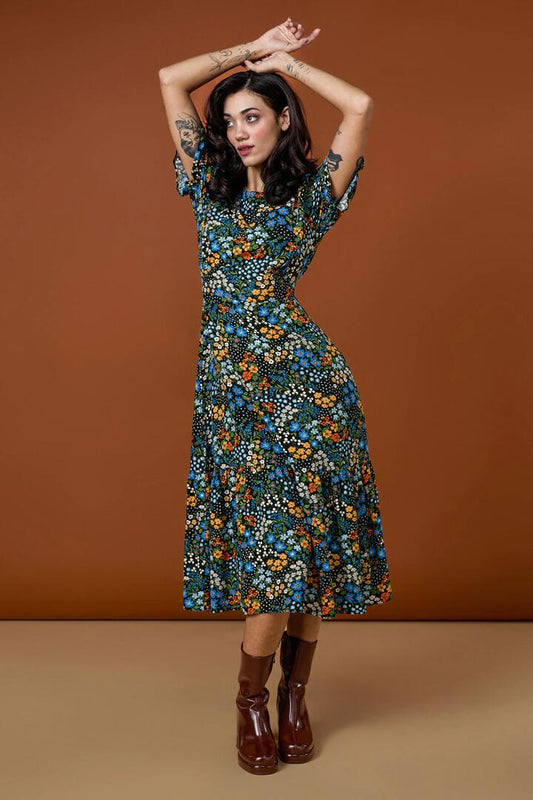 Image of a model wearing Dress. Productname: Ada 90's Floral Midi Dress in Blue colour by brand - Princess Highway