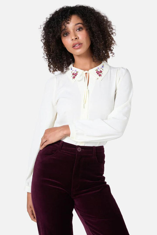 Image of a model wearing Tops. Productname: Ada Embroidered Blouse in Cream colour by brand - Princess Highway