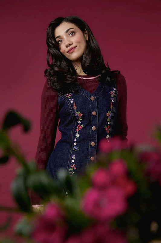 Image of a model wearing Dress. Productname: Ada Embroidered Pinafore in Blue Denim colour by brand - Princess Highway