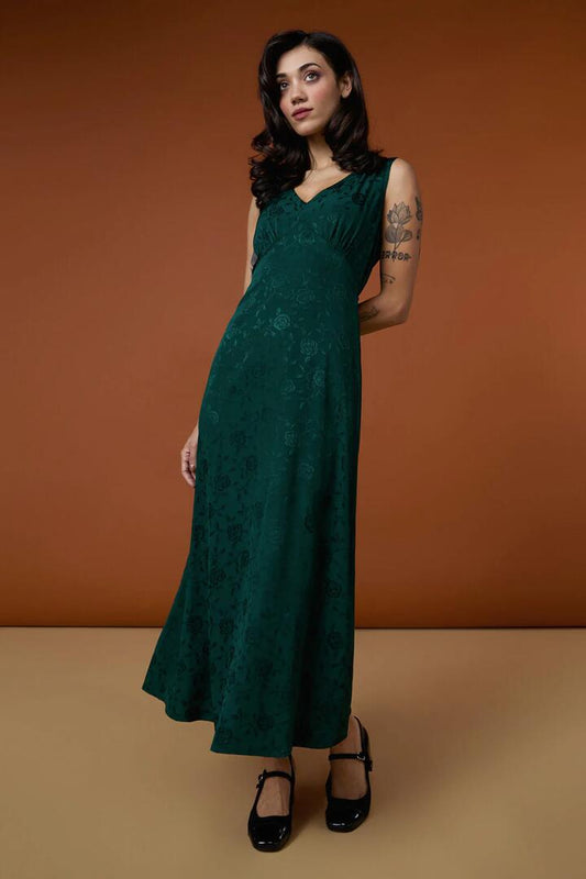Image of a model wearing Dress. Productname: Evie Rose Midi Dress in Black colour by brand - Princess Highway