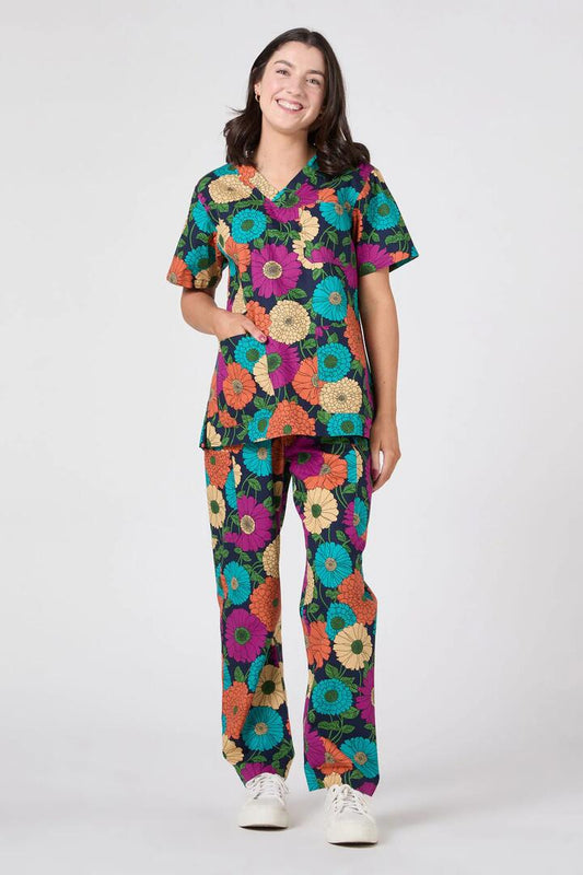 Image of a model wearing Uniforms & Workwear. Productname: Bonnie Floral Scrub Set in Navy colour by brand - Princess Highway