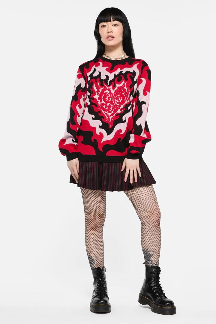 Image of a model wearing Tops. Productname: Heartbreak Knit in Multi colour by brand - Black Friday