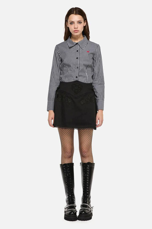 Image of a model wearing Skirts. Productname: Little Bitter Lacey Mini Skirt in Black colour by brand - Dangerfield