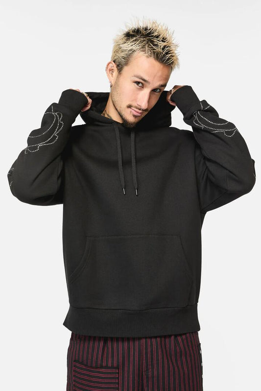 Image of a model wearing Outerwear. Productname: Dragon Wings Diamante Hoodie in Black colour by brand - Black Friday
