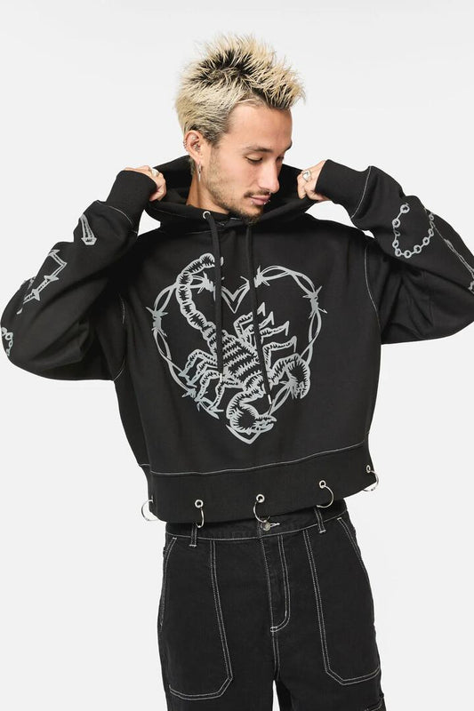 Image of a model wearing Outerwear. Productname: Scorpion Gothic Crop Hoodie in Black colour by brand - Dangerfield