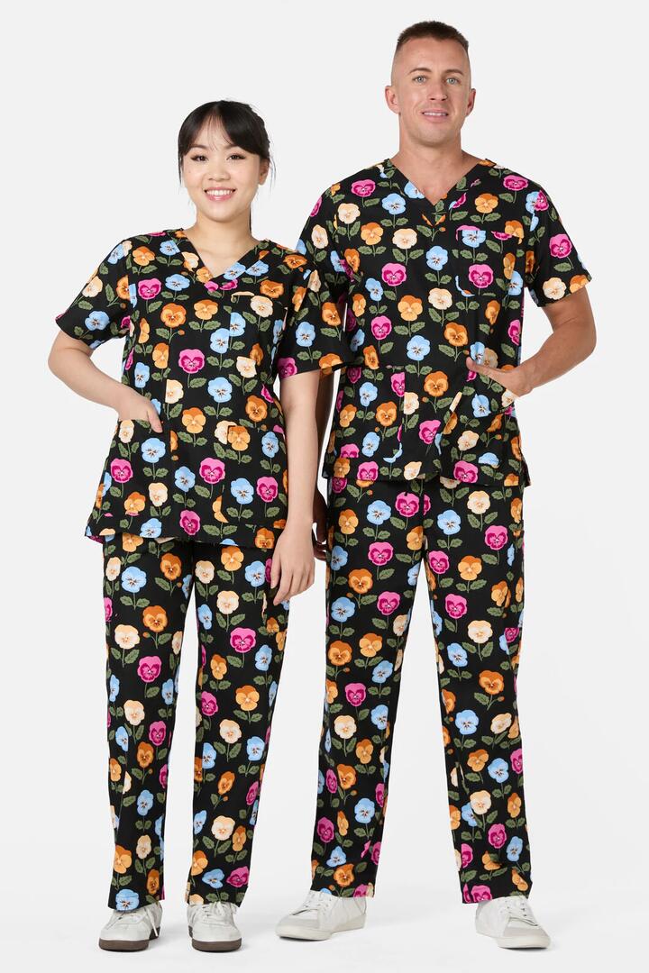 Image of a model wearing Uniforms & Workwear. Productname: Pansy Scrub Set in Black colour by brand - Scrubs With Love