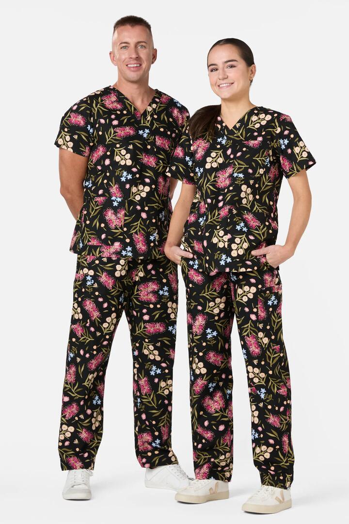 Image of a model wearing Uniforms & Workwear. Productname: Bottlebrush Scrub Set in Black colour by brand - Scrubs With Love