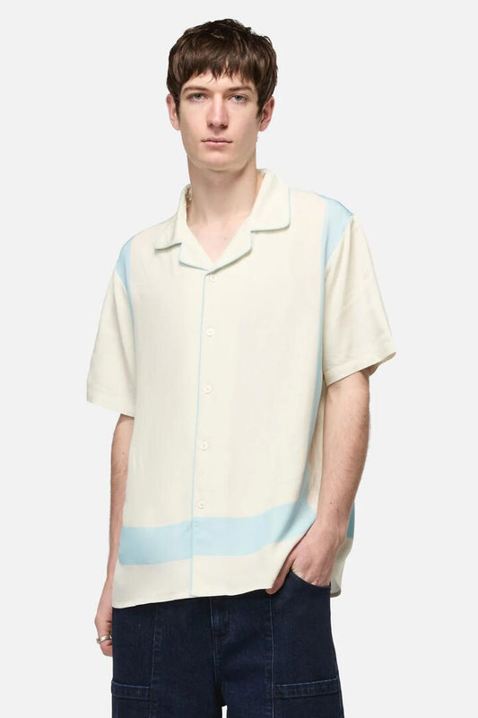 Image of a model wearing Tops. Productname: Catkins Viscose Shirt in Cream colour by brand - Dangerfield