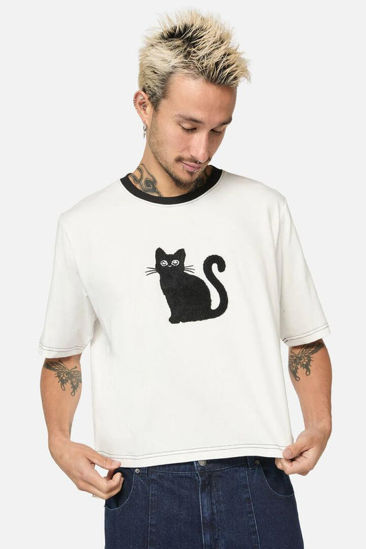 Image of a model wearing Tops. Productname: Catkins Cropped Unisex Tee in White colour by brand - Dangerfield