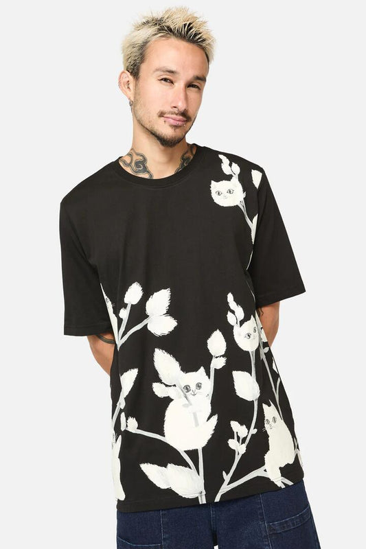 Image of a model wearing Tops. Productname: Pussy Willow Print Tee in Black colour by brand - Dangerfield