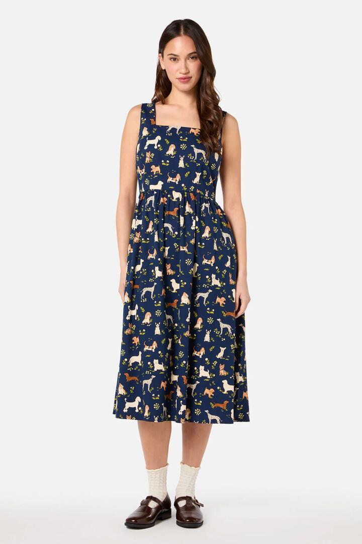 Image of a model wearing Dress. Productname: Cute Dogs Midi Dress in Navy colour by brand - Princess Highway