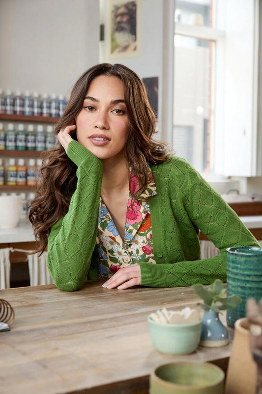Image of a model wearing Outerwear. Productname: Celeste Cardi in Green colour by brand - Princess Highway