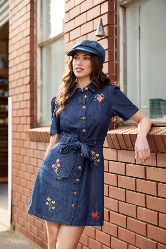 Image of a model wearing Denim. Productname: Folk Art Denim Dress in Mid Denim colour by brand - Princess Highway