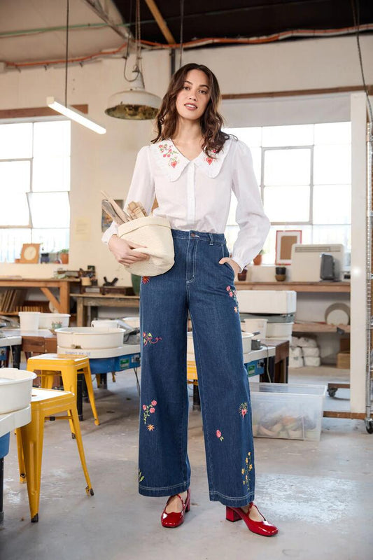 Image of a model wearing Denim. Productname: Folk Art Embroidered Jean in Blue Denim colour by brand - Princess Highway