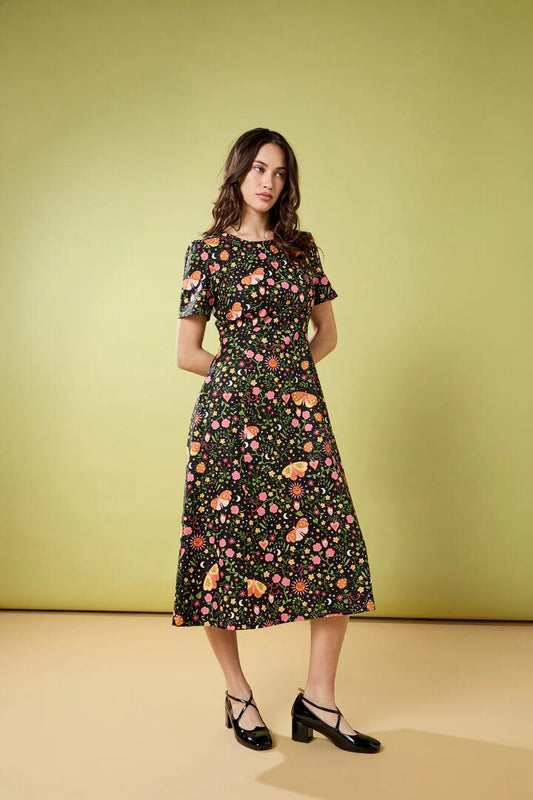 Image of a model wearing Dress. Productname: Folk Art Midi Dress in Pink colour by brand - Princess Highway