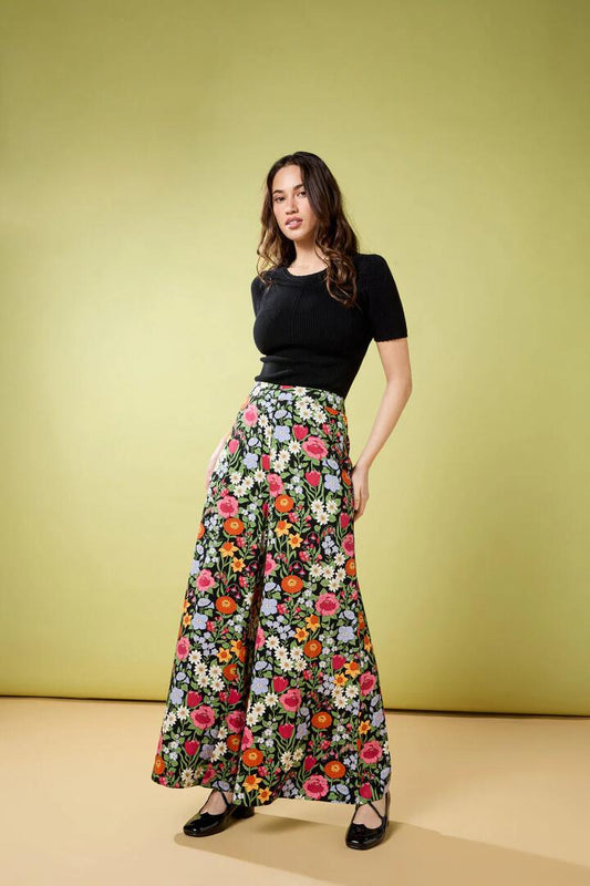 Image of a model wearing Pants. Productname: Floral Field Palazzo Pant in Black colour by brand - Princess Highway