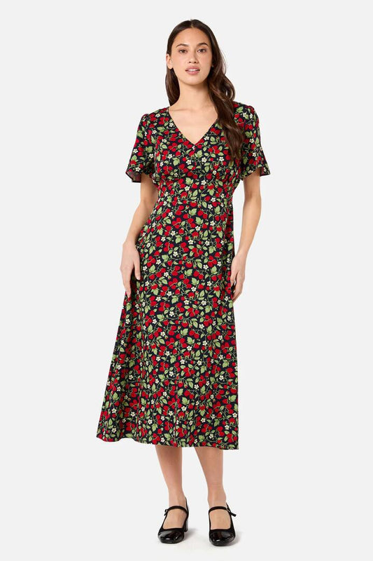 Image of a model wearing Dress. Productname: Raspberry Midi Dress in Navy colour by brand - Princess Highway