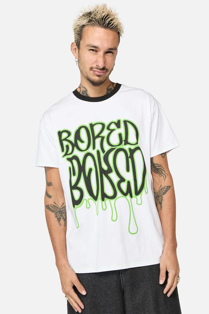 Image of a model wearing Tops. Productname: Bored Print Tee in White colour by brand - Black Friday