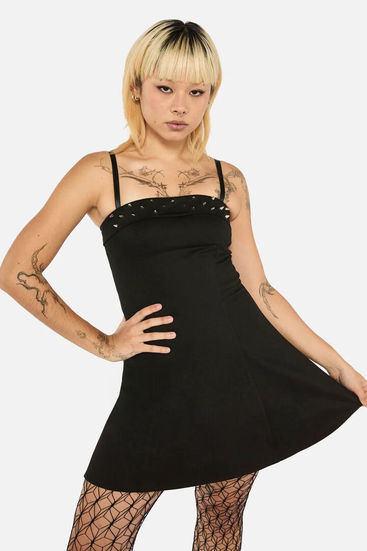Image of a model wearing Dress. Productname: Laneway Studs Flared Dress in Black colour by brand - Black Friday