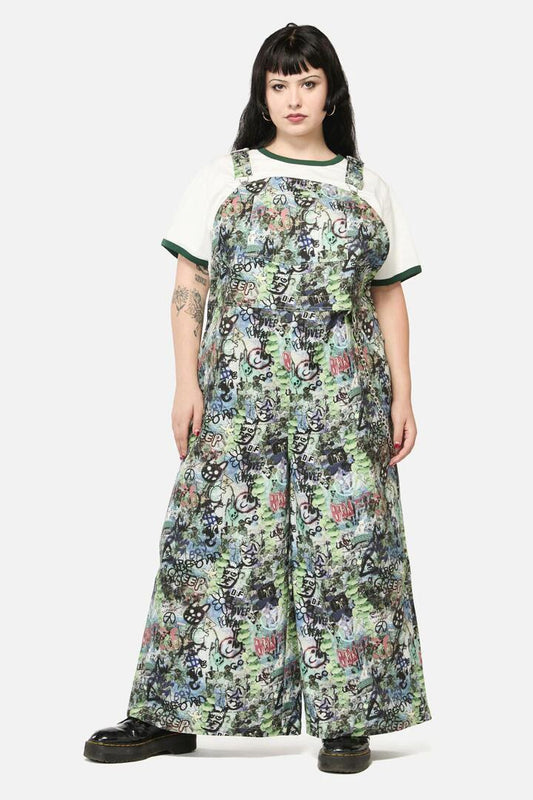 Image of a model wearing Pants. Productname: Curve Laneway Print Drill Overalls in Multi colour by brand - Black Friday