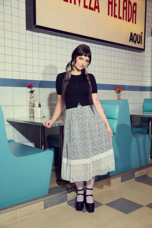 Image of a model wearing Dress. Productname: Forgotten City Lace Dress in White colour by brand - Dangerfield