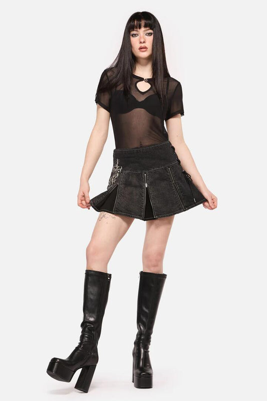 Image of a model wearing Denim. Productname: Sigil Denim Pleated Skort in Black colour by brand - Black Friday
