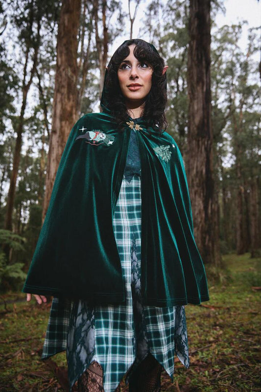 Image of a model wearing Outerwear. Productname: Keeper Of The Woods Velvet Cloak in Emerald colour by brand - Black Friday