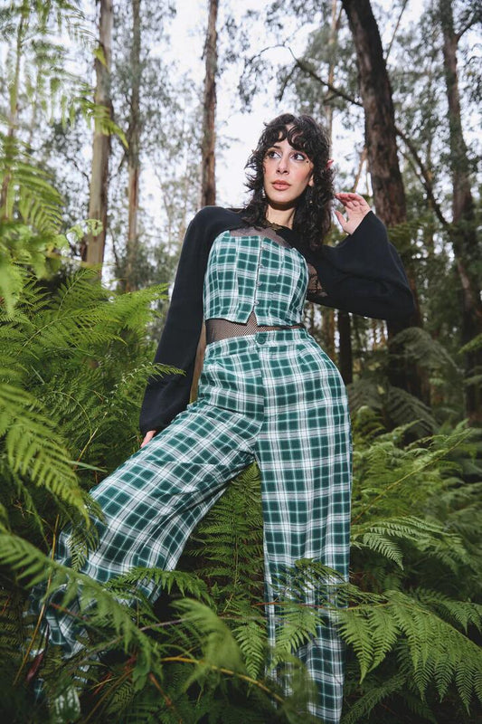 Image of a model wearing Pants. Productname: Keeper Of The Woods Tartan Wide Leg Pants in Sage colour by brand - Black Friday