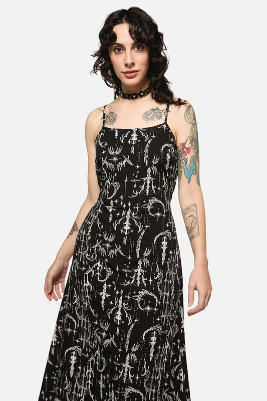 Image of a model wearing Dress. Productname: Cyber Sigil Slip Dress in Black colour by brand - Black Friday