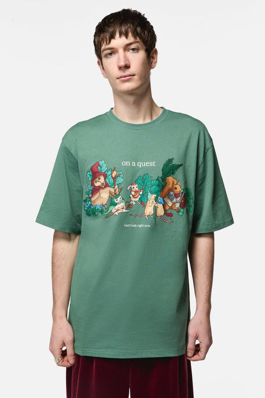Image of a model wearing Tops. Productname: On A Quest Print Tee in Teal colour by brand - Black Friday