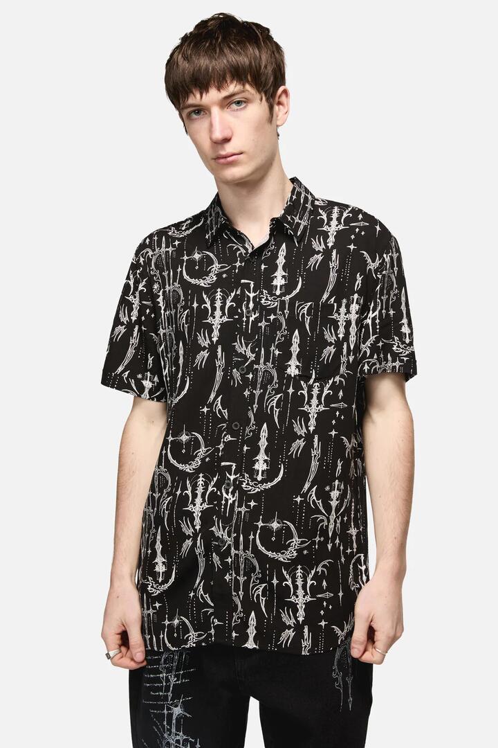 Image of a model wearing Tops. Productname: Cyber Print SS Shirt in Black colour by brand - Black Friday
