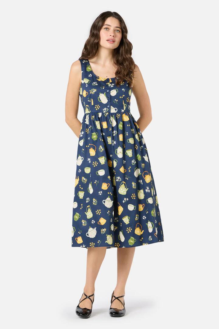 Image of a model wearing Dress. Productname: Tea Time Midi Dress in Navy colour by brand - Princess Highway