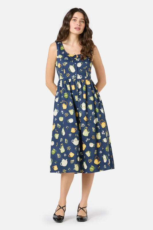 Image of a model wearing Dress. Productname: Tea Time Midi Dress in Navy colour by brand - Princess Highway